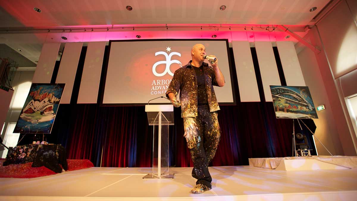 Arbonne Conference - Brad Blaze speed painter - on stage